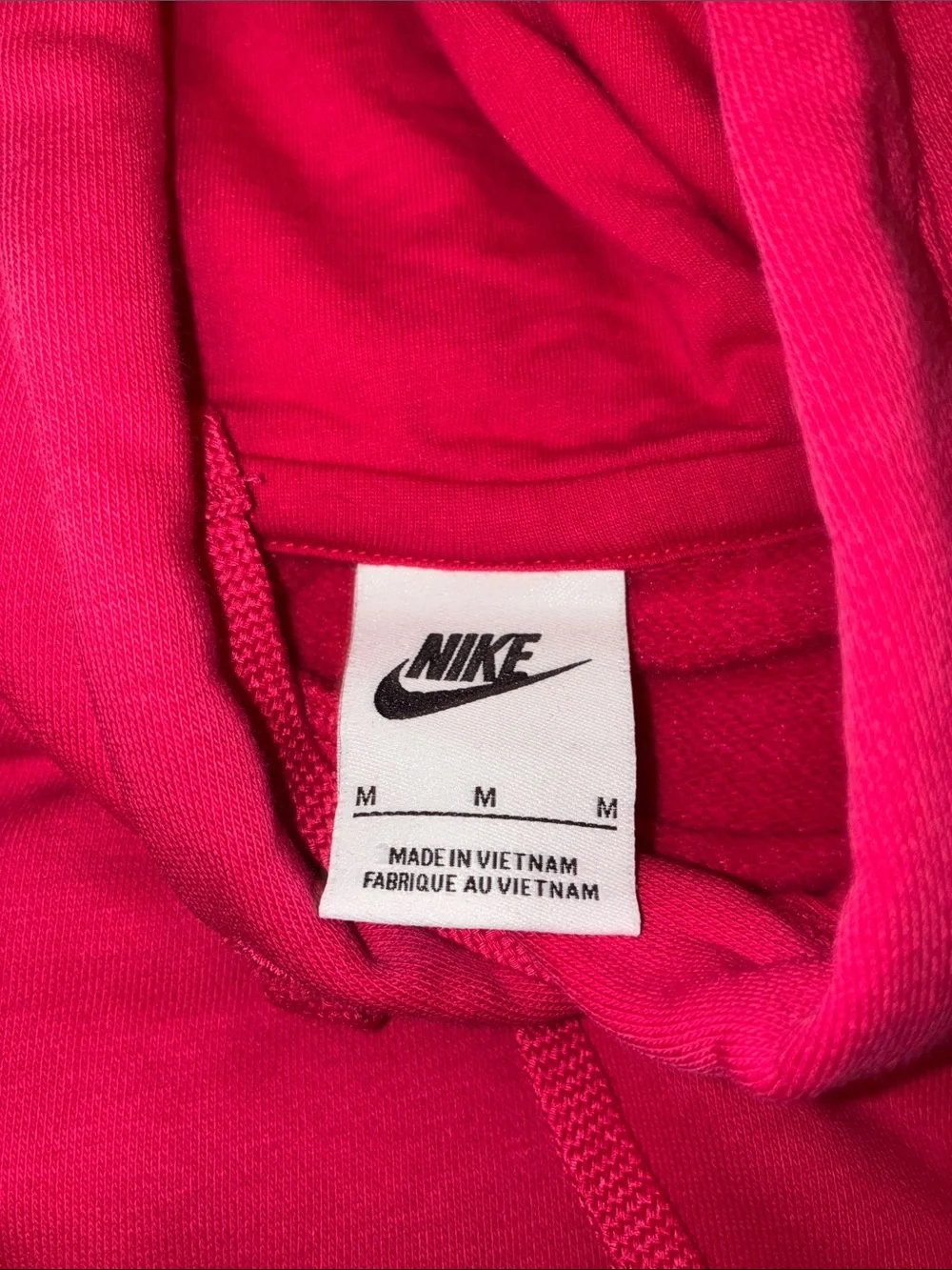 Hot pink women’s Nike sweatshirt